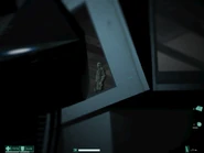 Harlan Wade in Vault, prepared to release Alma.