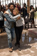 Travis and Madison embrace when he arrives at the gates-2-935