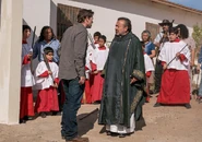 Thomas confronts the priest