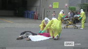 Homeless Man being body bagged.png