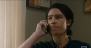 Chris on the phone to Travis, he doesn't look happy either.