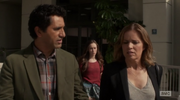 Travis walks Madison and Alicia out to the car at the hospital.
