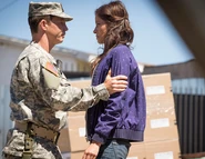 Adams calming Ofelia down.