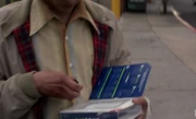 Nick, calling his drug dealer, who turns out to be Calvin.