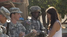 Ofelia chats with a Guardsman