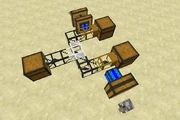 Iron pipe combining two pipelines into a single output. The clear end indicates the output