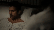 Max Bailey gets out of bed and starts to get dressed