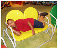 Khalil is relax, somehow, on Ruff's hard metal lawn chairs on the set.