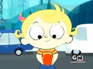 Young Man Rivers very happy and playing his ball outside on the road.