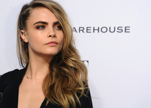 The host Cara Delevingne