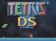 Mario fighting Tetrominos in the game's title screen.