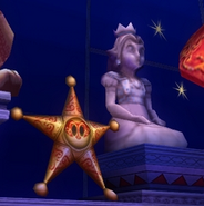 The Peach and Star statues.