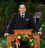 Dennis, giving his speech at the memorial.