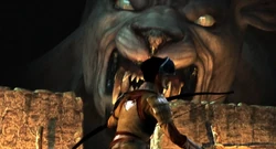 A Behemoth breaks through the city walls.