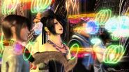 Lulu views a sphere recording of Zanarkand's glory days in Final Fantasy X.