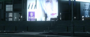 Billboard with a woman in Kingsglaive FFXV