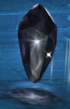 A black Warp Crystal.