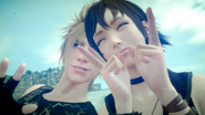 Iris e Prompto.