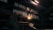 Barret shoots at boxes from FFVII Remake
