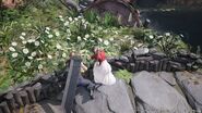 Cloud and Aerith picking flowers from FFVII Remake