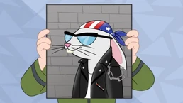 740px-Dennis as a biker.jpg (44 KB)