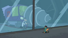 1000px-Perry behind glass wall