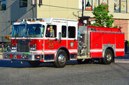 A late 1990s-2007 era Spartan Metro Star MFD w/ 10" roof