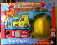 Rescues Playset with Sam figure, Jupiter toy, Tom's Helicopter toy, Tom's 4 by 4 toy and a toy Fire Helmet (front of the box)