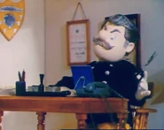 Station Officer Steele trimming his moustache in preparation for his TV appearance