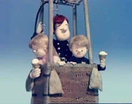 Sarah and James riding in a hot air balloon with their Uncle Sam