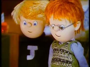 James and Norman watching Station Officer Steele on TV