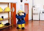 Norman wearing a firefighter outfit in Firefighter of Tomorrow