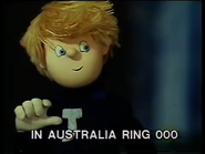 The caption added to Australian releases, indicating the different emergency number