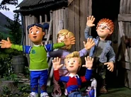 Sarah, James, Mandy and Norman waving to Tom in Fun Run