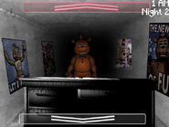 The first Screenshot, that depicts Toy Freddy down the hall of what is possibly The Office.