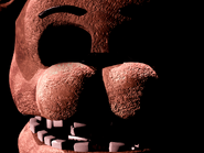 Raro Withered Freddy senza occhi che apparirà raramente all'avvio del gioco, illuminato e saturato per chiarezza.