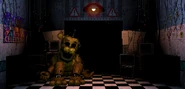 La forma withered di Golden Freddy seduta all'interno dell'ufficio.