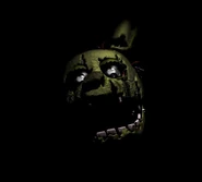 La testa di Springtrap come appare per alcuni secondi sul port mobile del terzo gioco prima dell'avvio della schermata del menu principale.