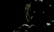 Uno dei fotogrammi di Springtrap che si contrae nel menu principale del "gioco troll".