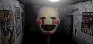 Il volto del Puppet nel corridoio principale.