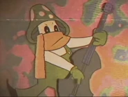 Miceliomino verde che suona la chitarra.