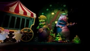 Palcoscenico con mascotte alligatore e ippopotamo.