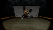 The Face occupying the stairs of the first floor of Pirate Caverns with the flashlight on.