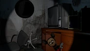 The Face in the tech room of the first floor of Pirate Caverns with the flashlight on.