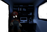 Mario in the office with the player.