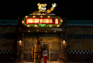 Abby with Golden Freddy outside of Freddy Fazbear's Pizza