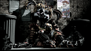 A secret screen of Scrap Baby in the alleyway