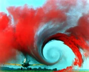 Photo of 3d air flow caused by a plane showing vortices. The very action of producing lift causes vortex shedding. NASA visualisation created by releasing coloured particles into the air.