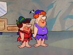 Fred and Barney disguised as Wilma and Betty in the episode, "In the Dough".