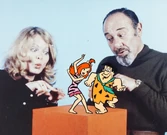 Alan Reed and Sally Struthers with Pebbles and her father, Fred dancing from a publicity cel of The Pebbles and Bamm-Bamm Show.